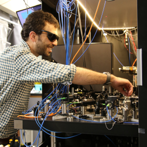 JILA Fellow and NIST Physicist Adam Kaufman at work in his lab