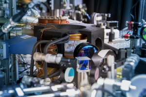 A round glass cell (centre, in black frame) is designed to hold a gas of molecules cooled to 50 billionths of a Kelvin. 