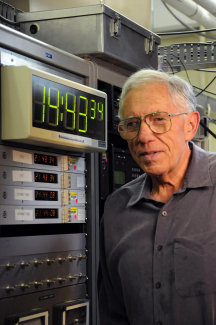 JILA and NIST Fellow Judah Levine in front of his timekeeping system. 