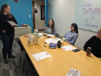 (L to R): Postdoc Dina Rosenberg speaks to graduate students Sofia Brown and Da Thi Hoang, along with postdoc Rachael Merritt about women in science. 