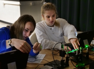 Students working on fiber optics lab