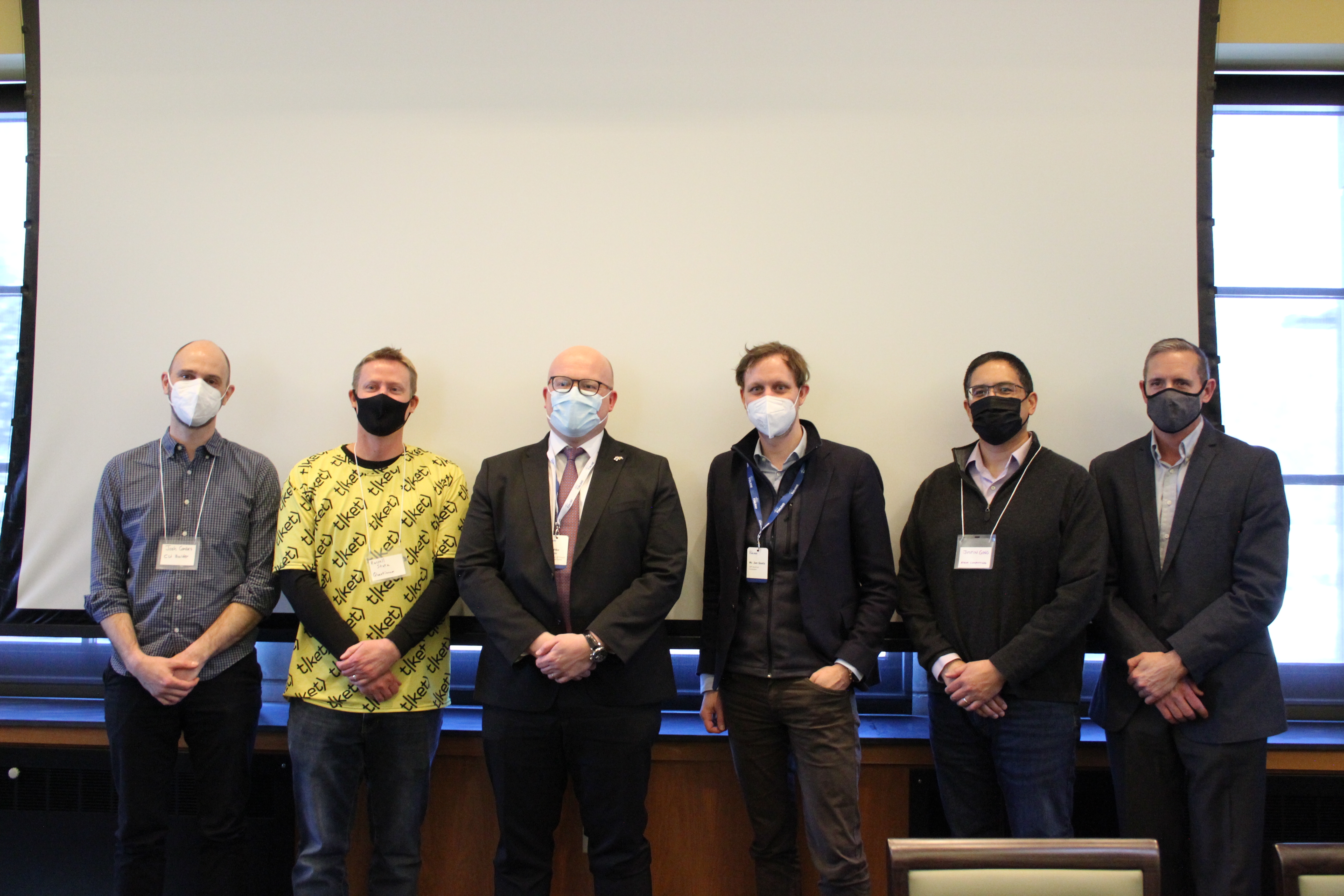 Russ Stuz of Quantinuum, Jan Goetz of IQM, Justin Ging of Atom Computing and Barry Behnken of ColdQuanta with Finnish Ambassador Mikko Hautala