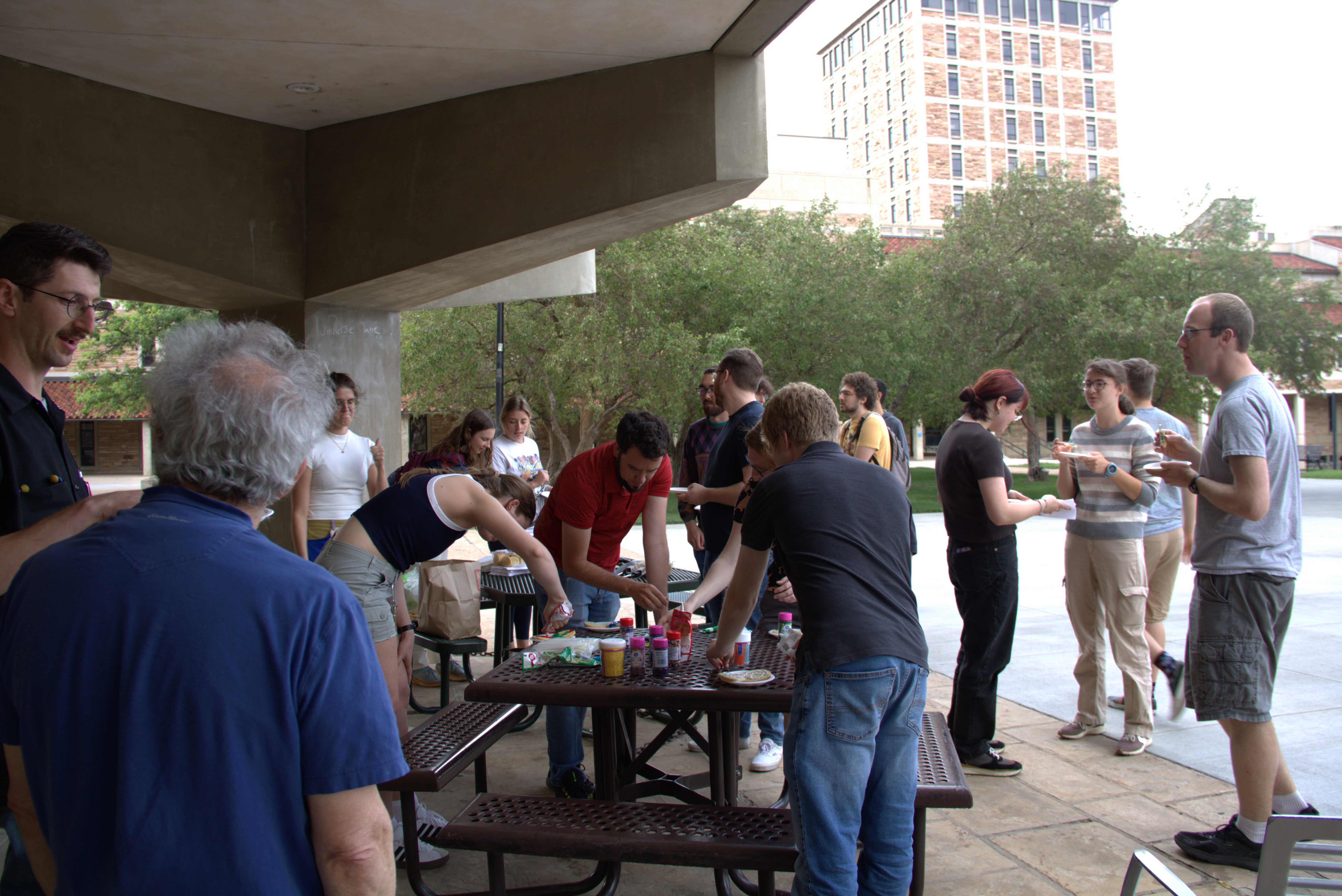 Onlookers watch the cookie decorating process