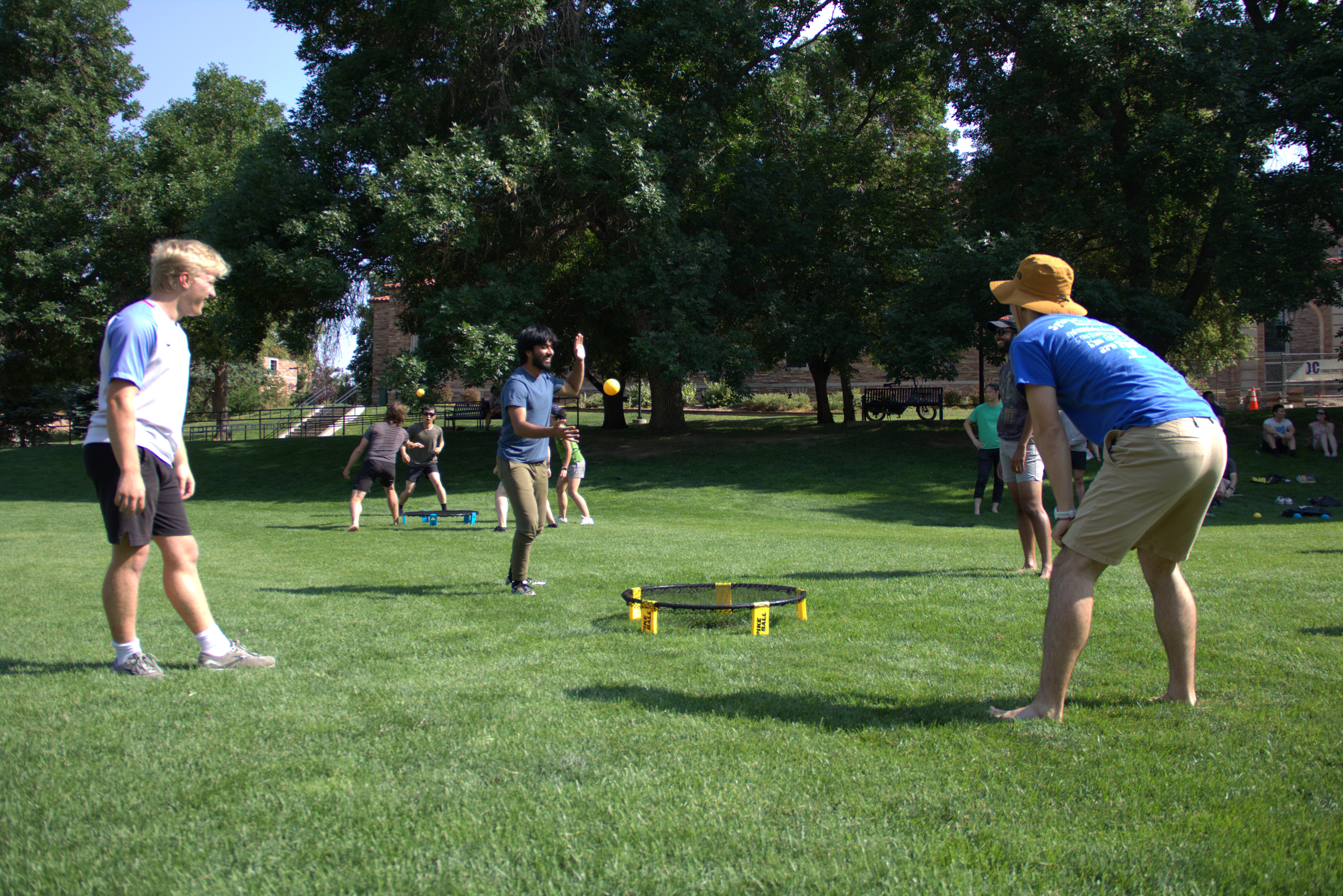 Pairs of players from both the Sun group and Lehnert group play spike ball to try to win the JILA cup