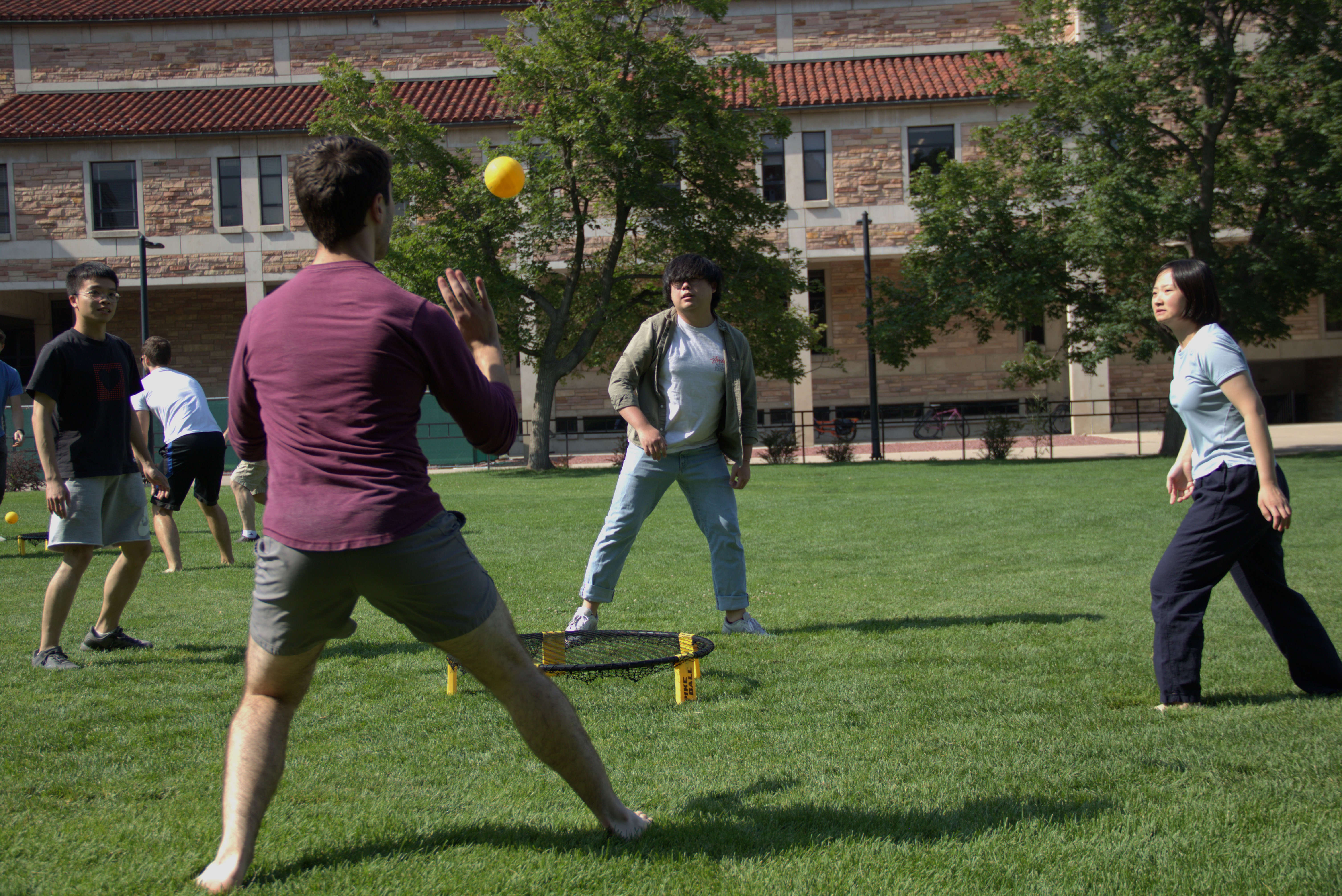 Pairs of players from both the Sun group and Lehnert group play spike ball to try to win the JILA cup