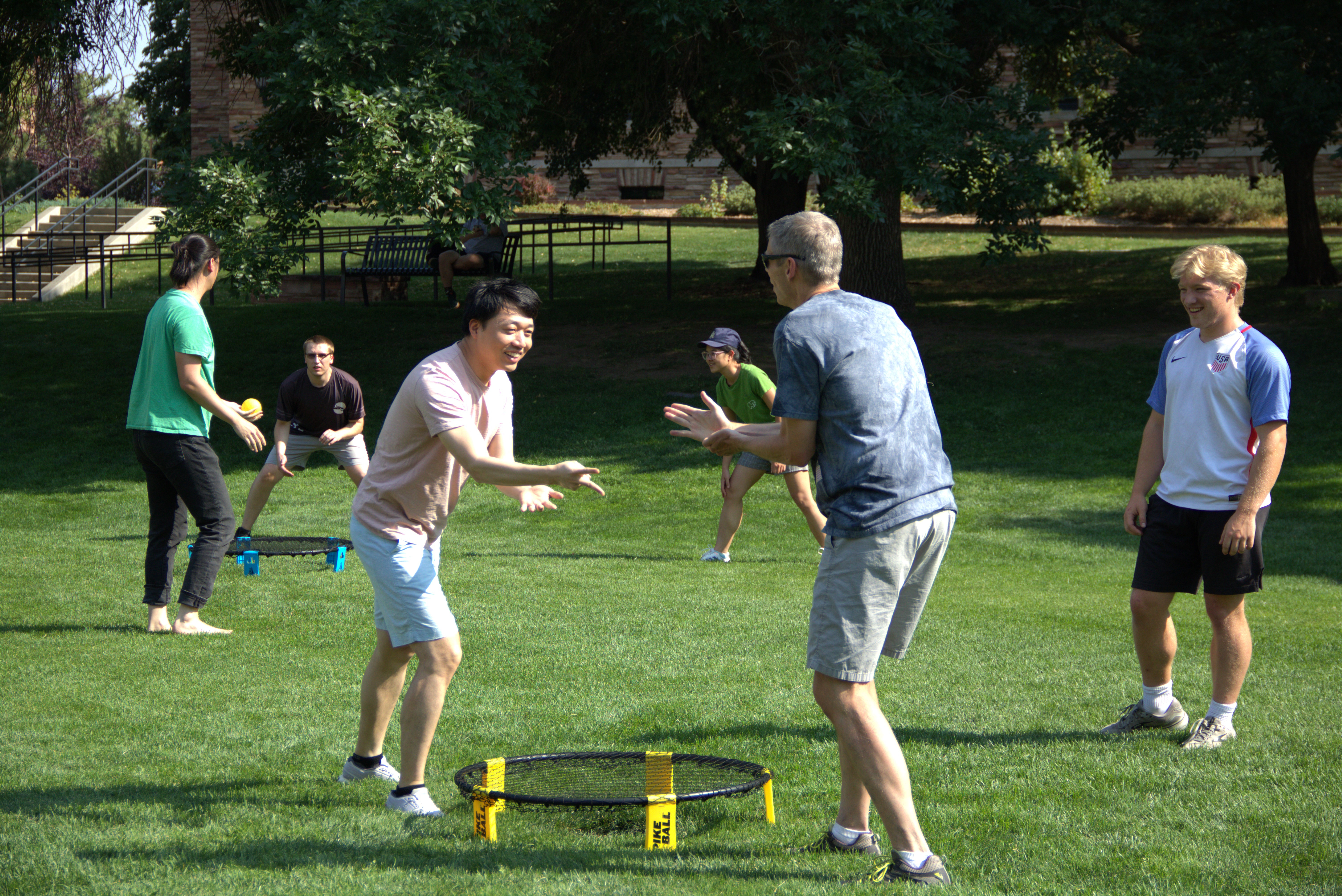 JILA Associate Fellow and University of Colorado Boulder Assistant Professor of Physics Shuo Sun plays rock-paper-scissors with JILA and NIST Fellow and University of Colorado Boulder Physics professor Konrad Lehnert to determine who stars the serve
