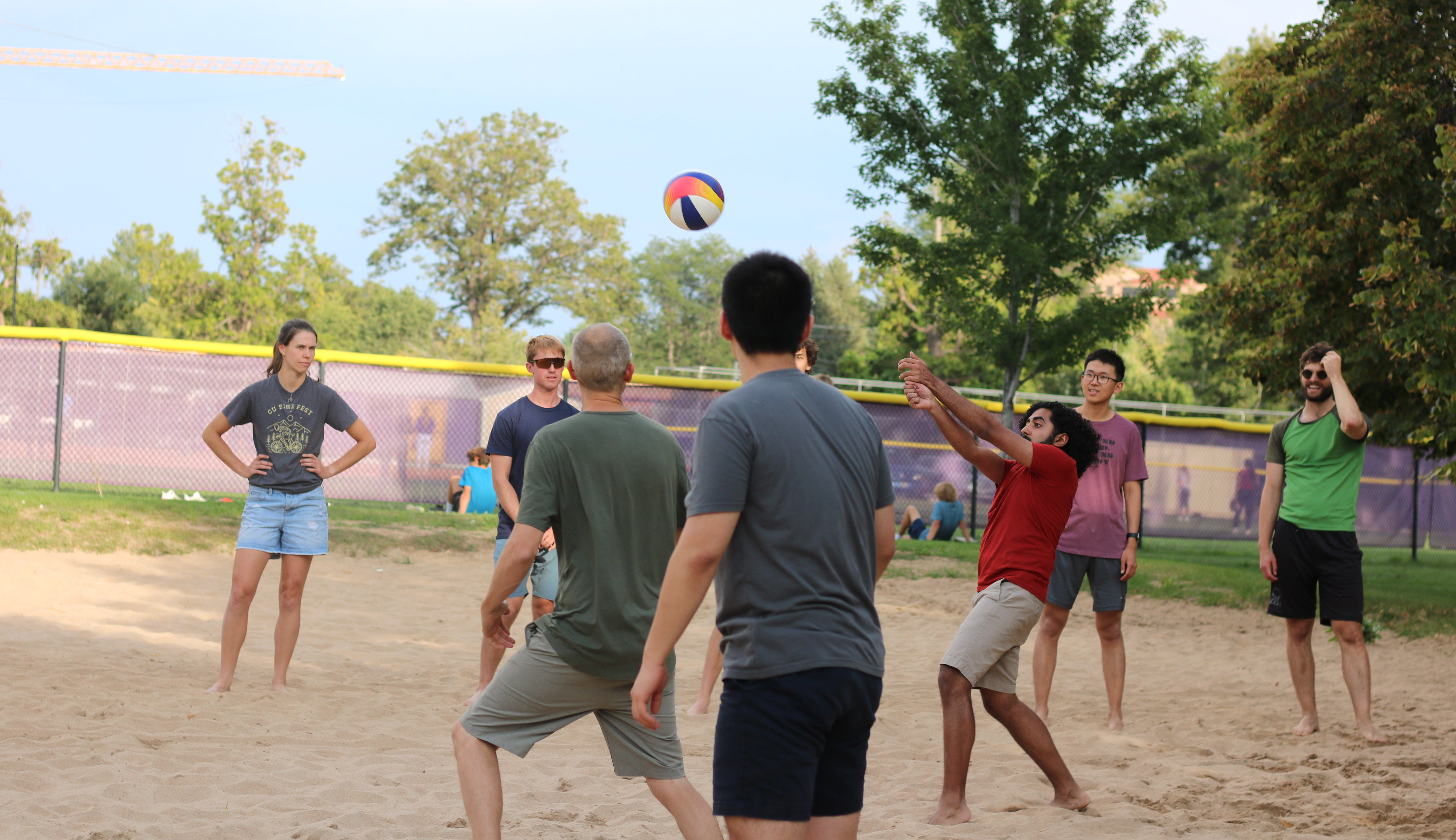 The Lehnert and Regal Groups battle it out on the beach volleyball court