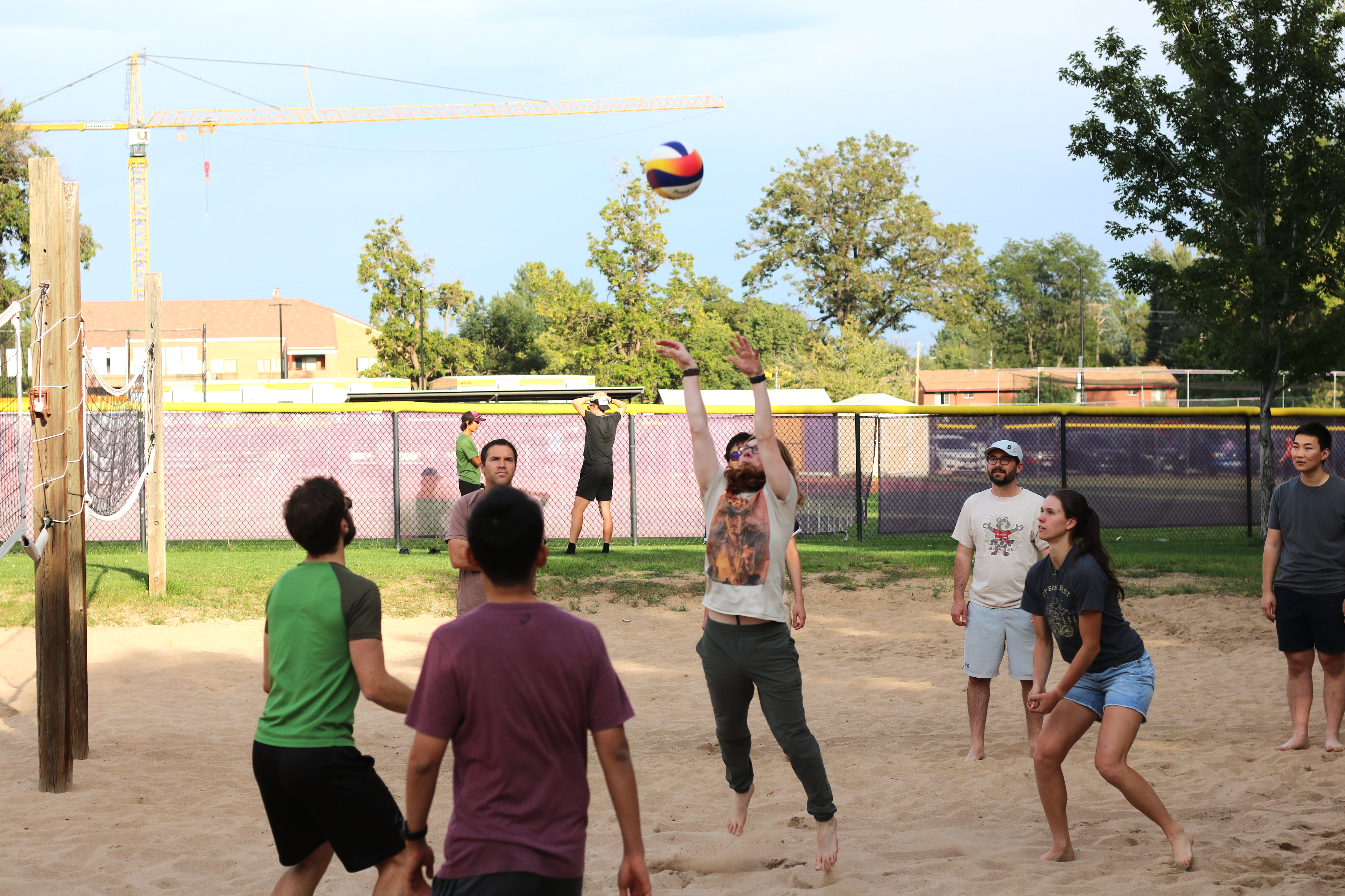 The Lehnert and Regal Groups battle it out on the beach volleyball court