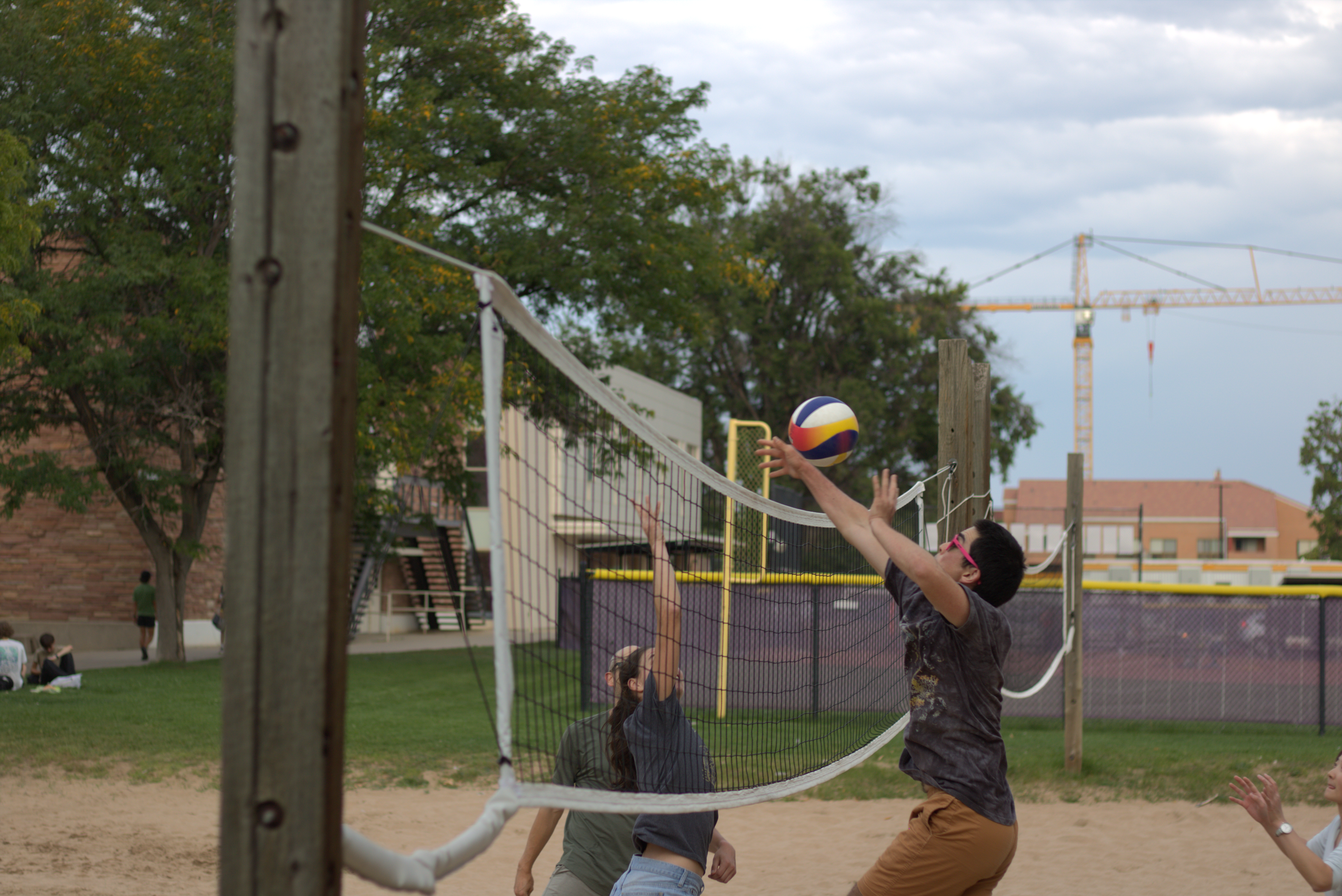 The Lehnert and Regal Groups battle it out on the beach volleyball court