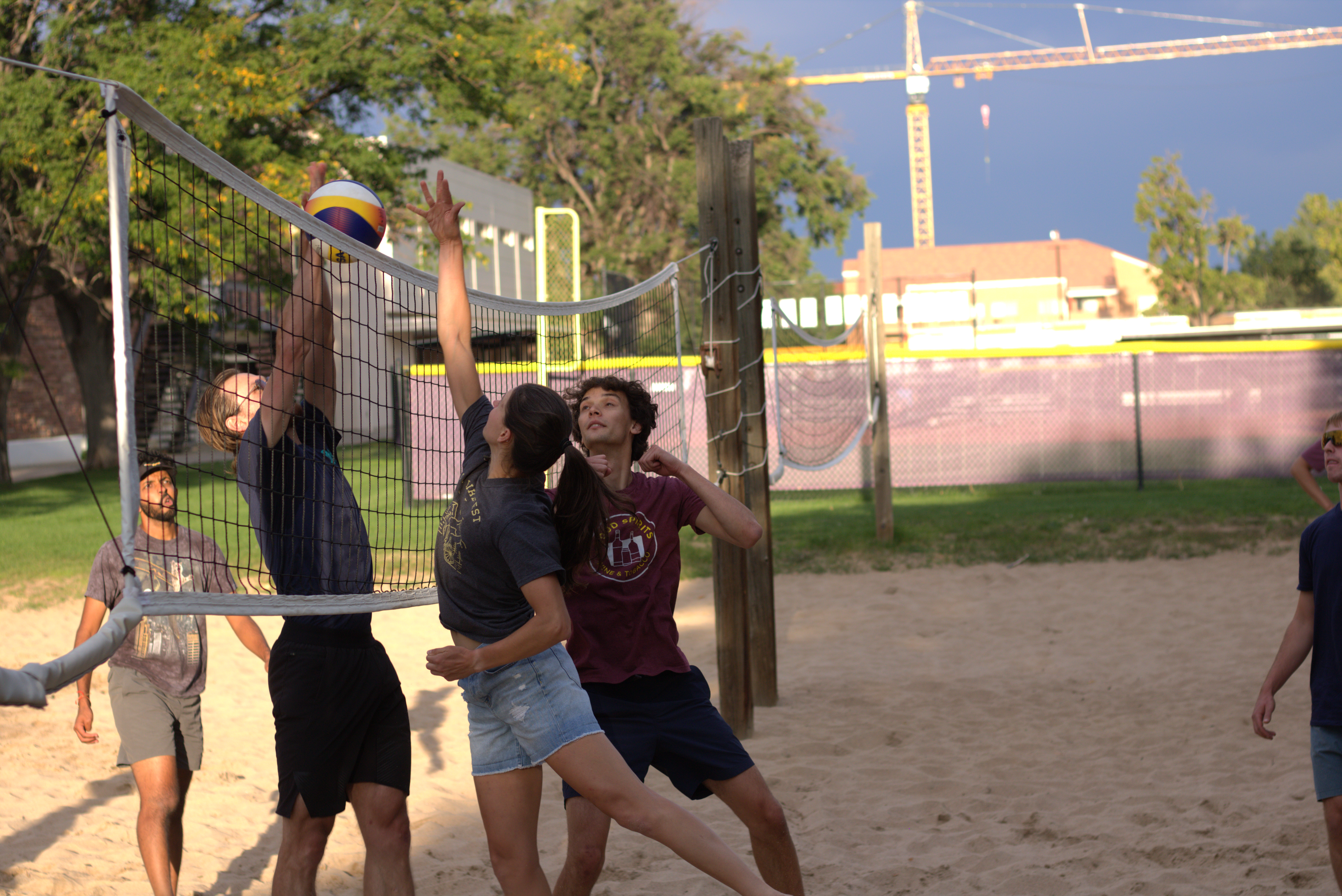 The Lehnert and Regal Groups battle it out on the beach volleyball court