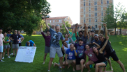 JILA and NIST Fellow and University of Colorado Boulder physics professor Konrad Lehnert celebrates with his research group their win of the JILA cup