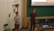 JILA graduate student Keegan Finger (left) fields questions for JILA graduate student Will Hettel (right) during the JAGS Seminar