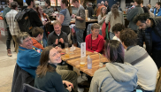 JILA Fellow and CU Boulder Physics Professor Murray Holland and JILA graduate Student Annette Carroll smile for the camera during the Life After JILA Alumni Mixer at the Rayback Collective in Boulder Colorado