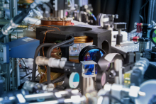 A round glass cell (centre, in black frame) is designed to hold a gas of molecules cooled to 50 billionths of a Kelvin. 